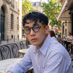 Model wearing Romero round glasses — Loulou Eyewear