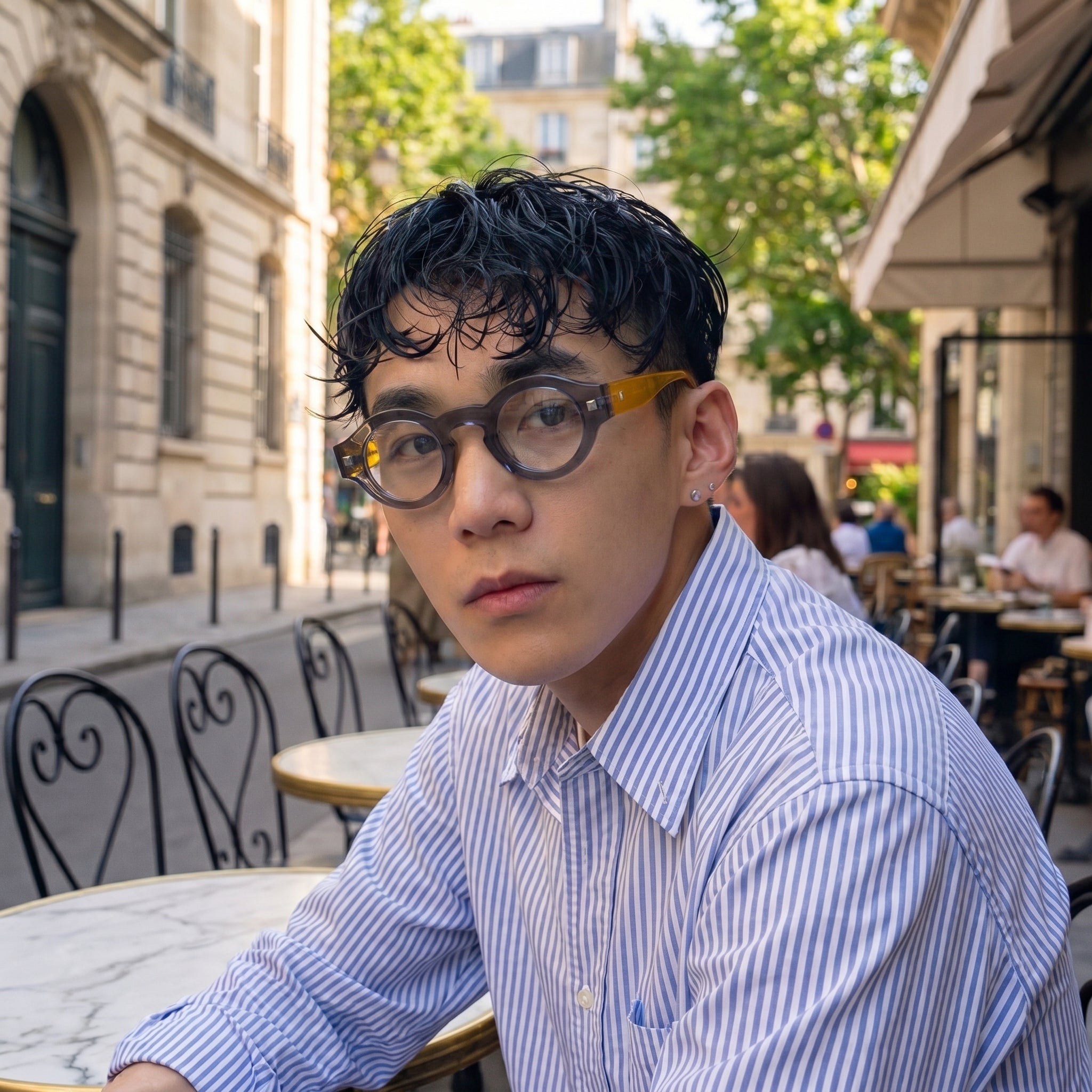 Model wearing Romero round glasses — Loulou Eyewear