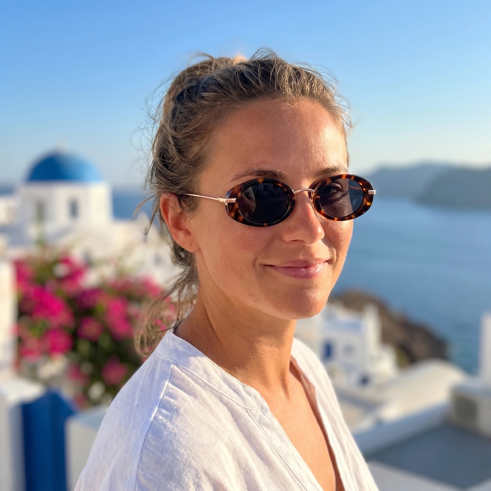 Model wearing Jasmin oval sunglasses — Loulou Eyewear