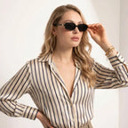Model wearing Mayfair cat-eye sunglasses — Loulou Eyewear